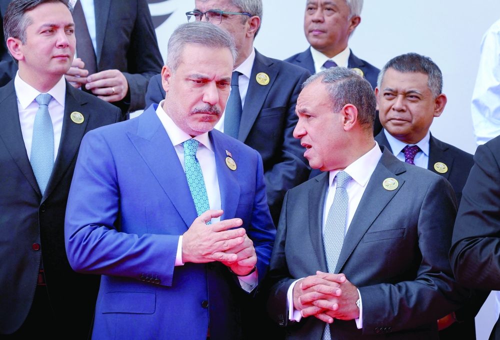 Türkiye’s Foreign Minister Hakan Fidan with Egypt’s Foreign Minister Badr Abdelatty at the OIC meeting in Baghdad last week. Abdelatty has called for a political solution to the Yemen conflict. — Reuters