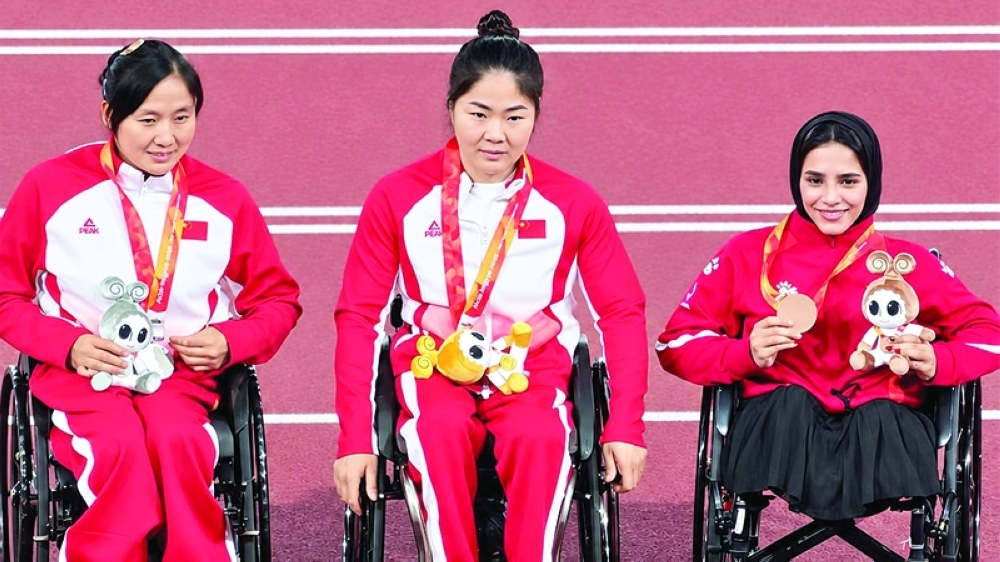 Rawan al Hasani (right) secured Oman’s first medal at the Aichi-Nagoya 2026 Asian Para Games on Wednesday, winning bronze in the women’s T53 wheelchair 100 metres in 22.49 seconds.
