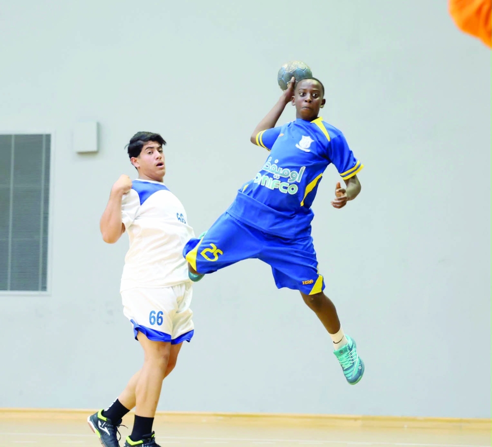 Nizwa player in action against Masirah.