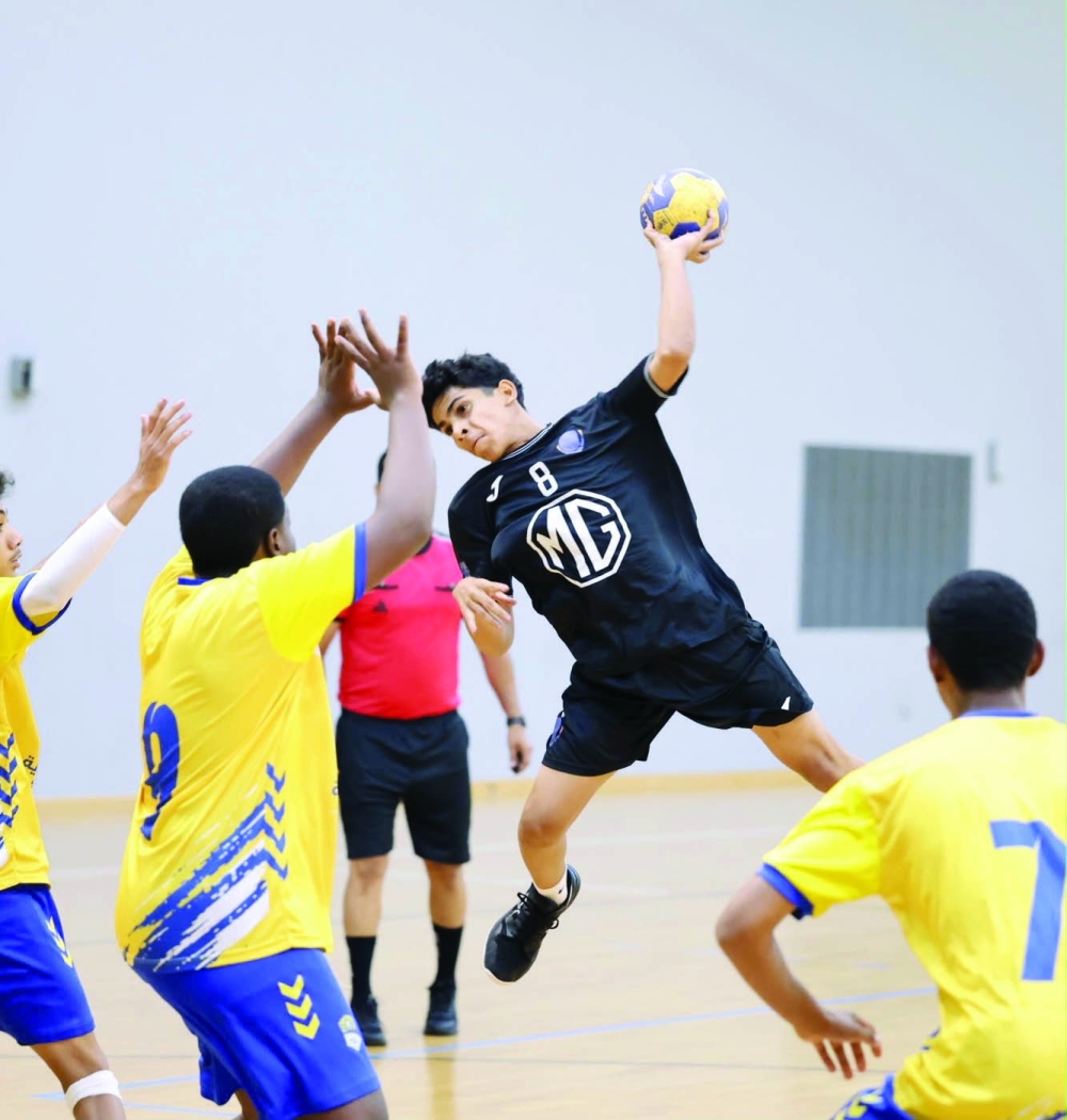 Al Amerat player makes a goal attempt against Ibri.
