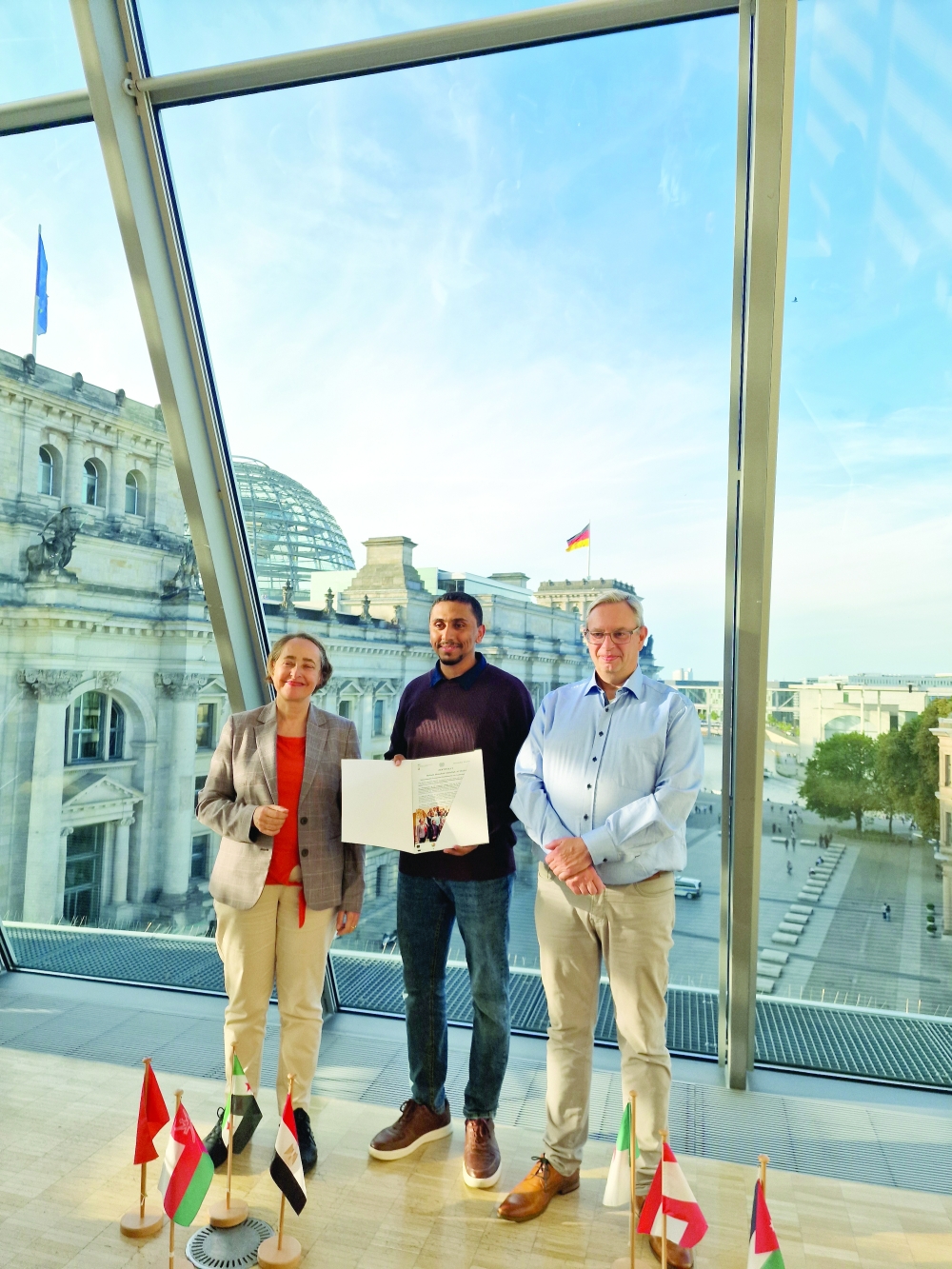 Mohsin al Shukaili holds the certificate upon completion of the IPS Programme.