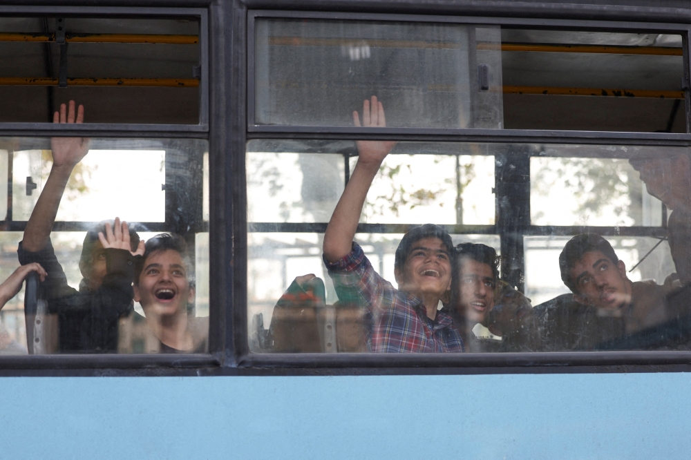 People sitting in a bus in Tehran, Iran