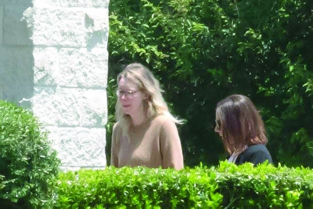 Theranos founder Elizabeth Holmes arrives at a federal prison in Bryan, Texas. — AFP
