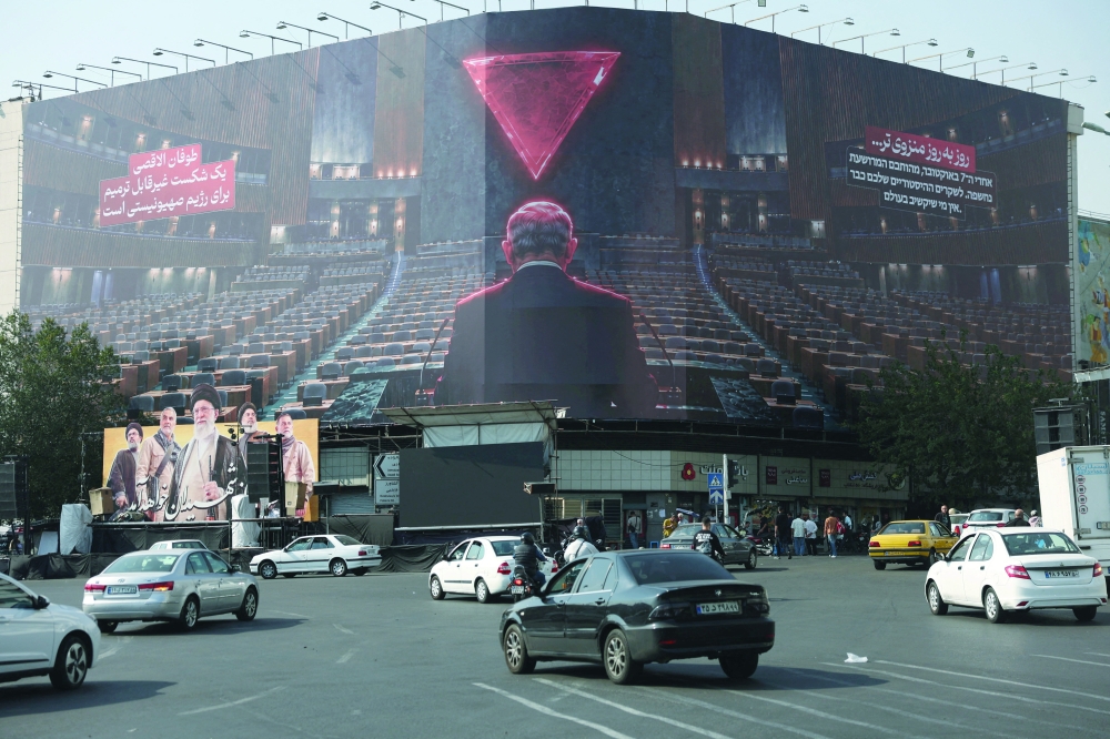 A billboard depicting Israeli Prime Minister Benjamin Netanyahu in the empty hall of the United Nations, on a building in Tehran. — Reuters 