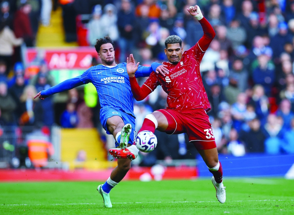 Liverpool's Ronald Araujo in action with Brighton and Hove Albion's Charalampos Kostoulas. — Reuters