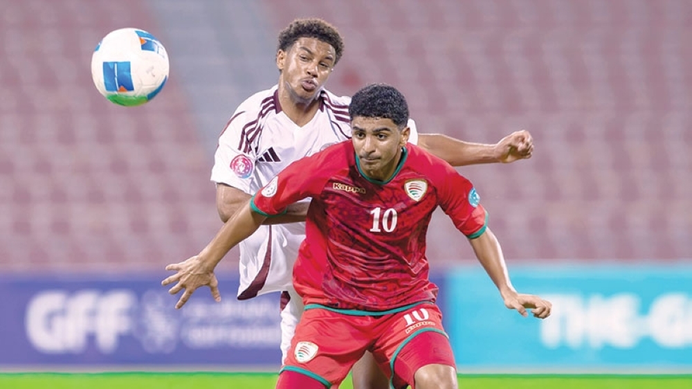 Oman U17 players in action against hosts Qatar during their 2-0 victory at Grand Hamad Stadium in Doha.