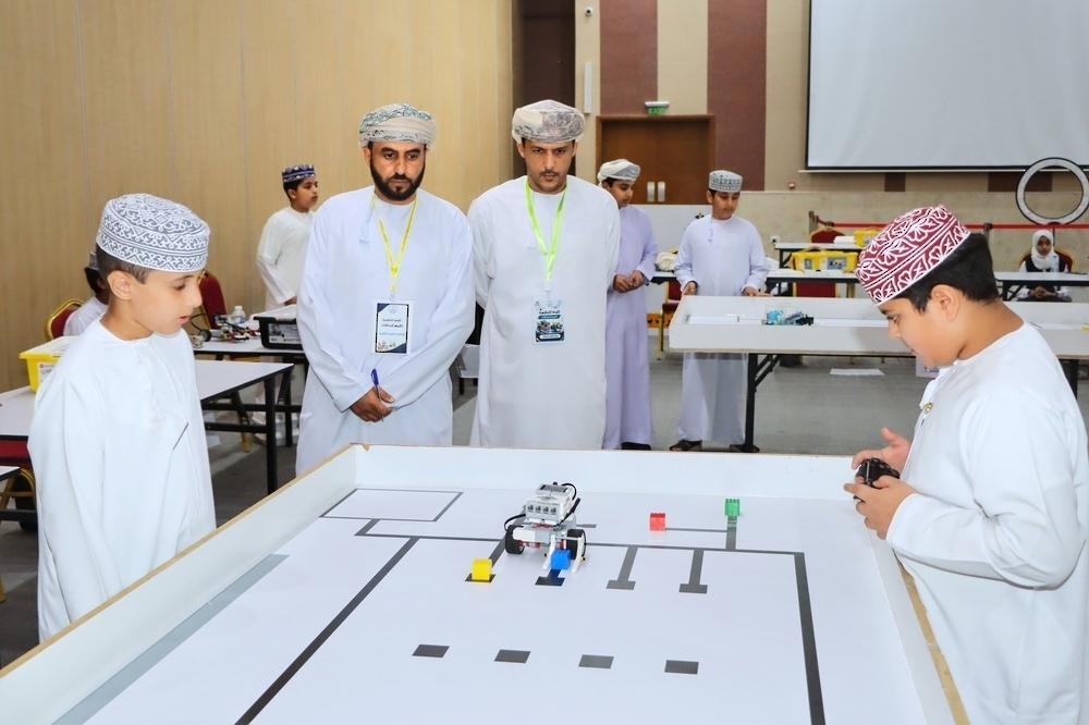 Students compete in the robotics category of the National Olympiad qualifiers at Liwa Centre for Science and Innovation. — ONA