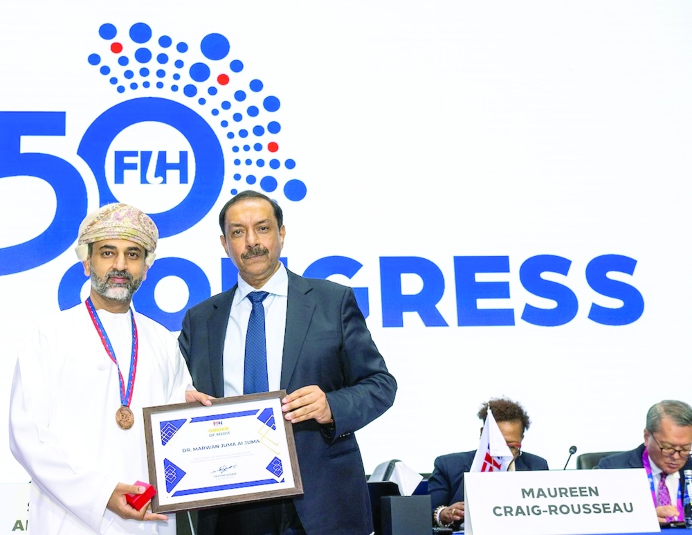 Dr Marwan al Juma received the FIH Order of Merit from FIH President Tayyab Ikram,  in recognition of his distinguished service at national, continental and international levels.