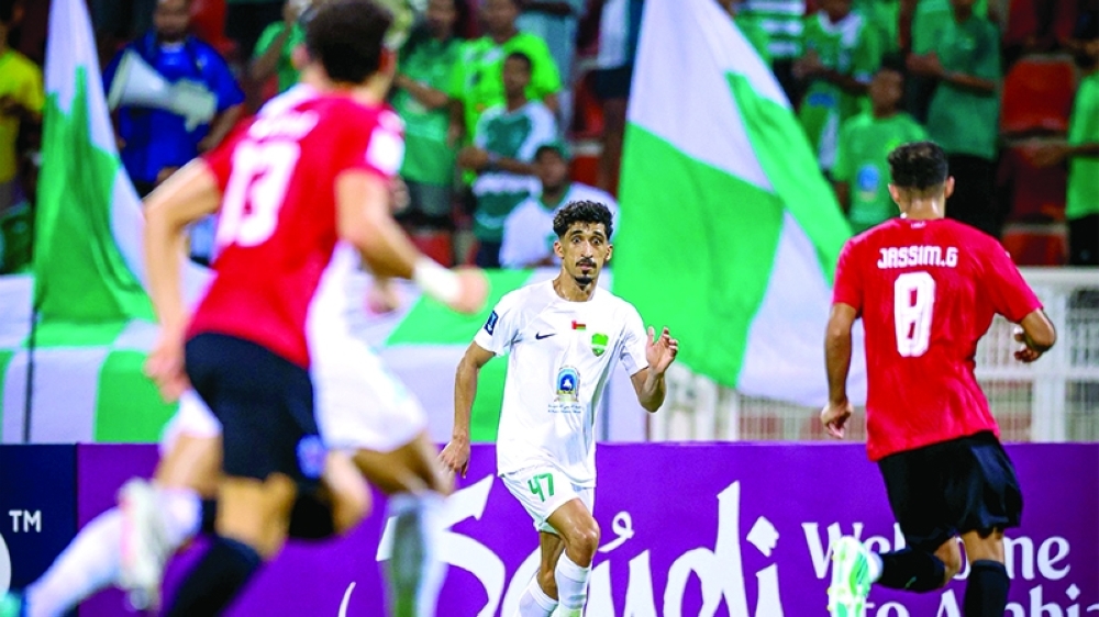 Al Nahda and Qatar’s Al Rayyan players in action during the AFC Champions League Two match in Muscat.