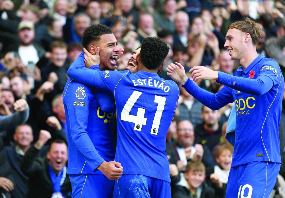 Chelsea's Morgan Rogers scores their first goal with Estevao, Pedro Neto and Cole Palmer. — Reuters