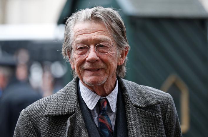 FILE PHOTO: Actor John Hurt arrives for a memorial service for actor and director Richard Attenborough at Westminster Abbey in London