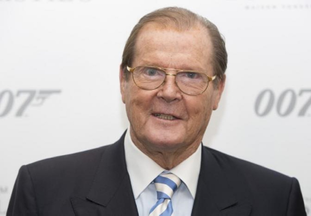 FILE PHOTO: Sir Roger Moore attends the 50 Years of James Bond Auction at Christies in London