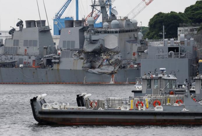 The Arleigh Burke-class guided-missile destroyer USS Fitzgerald, damaged by colliding with a Philippine-flagged merchant vessel, is seen at the U.S. naval base in Yokosuka