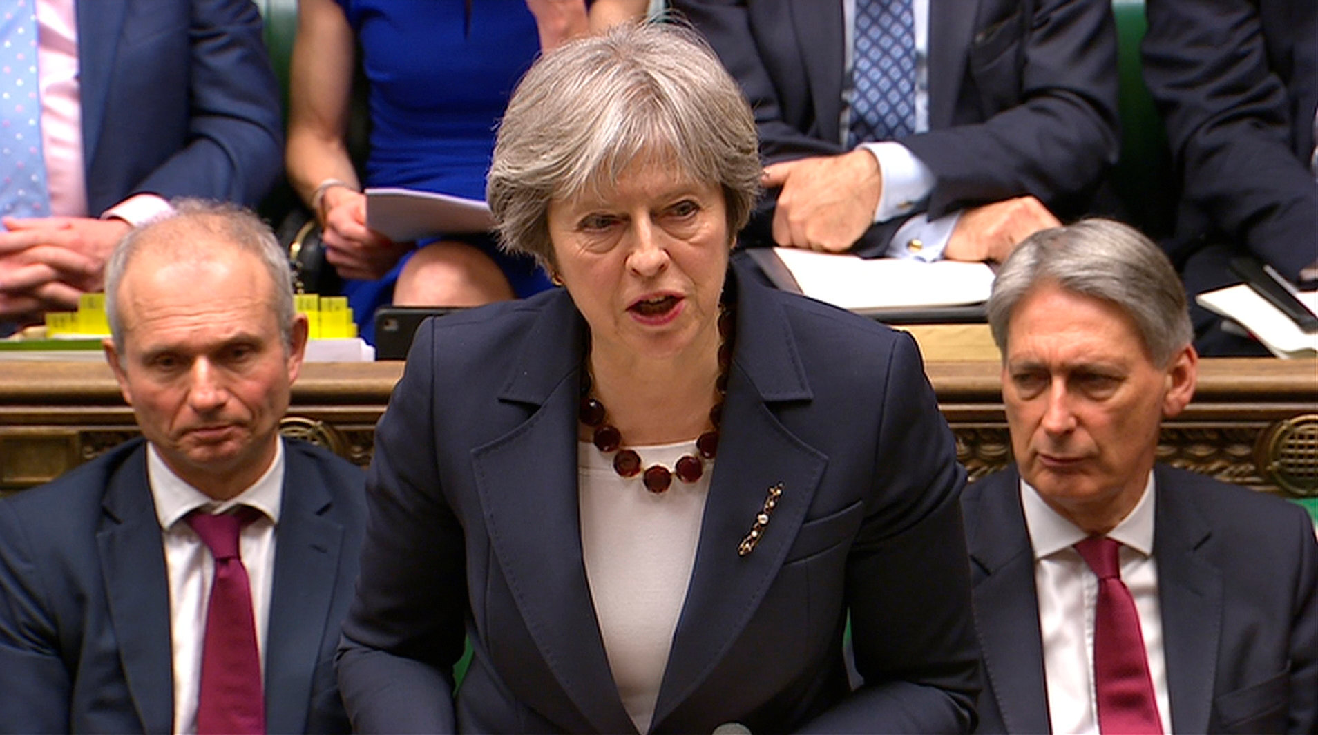 Britain's Prime Minister Theresa May addresses the House of Commons on her government's reaction to the poisoning of former Russian intelligence officer Sergei Skripal and his daughter Yulia in Salisbury, in London