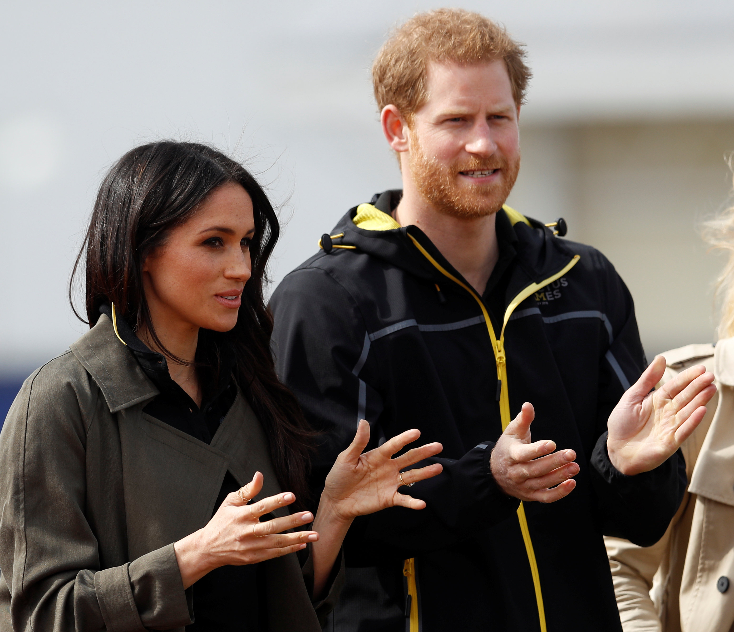 Britain's Prince Harry, Patron of the Invictus Games Foundation, and Meghan Markle watch athletes at the team trials for the Invictus Games Sydney 2018 at the University of Bath Sports Training Village in Bath