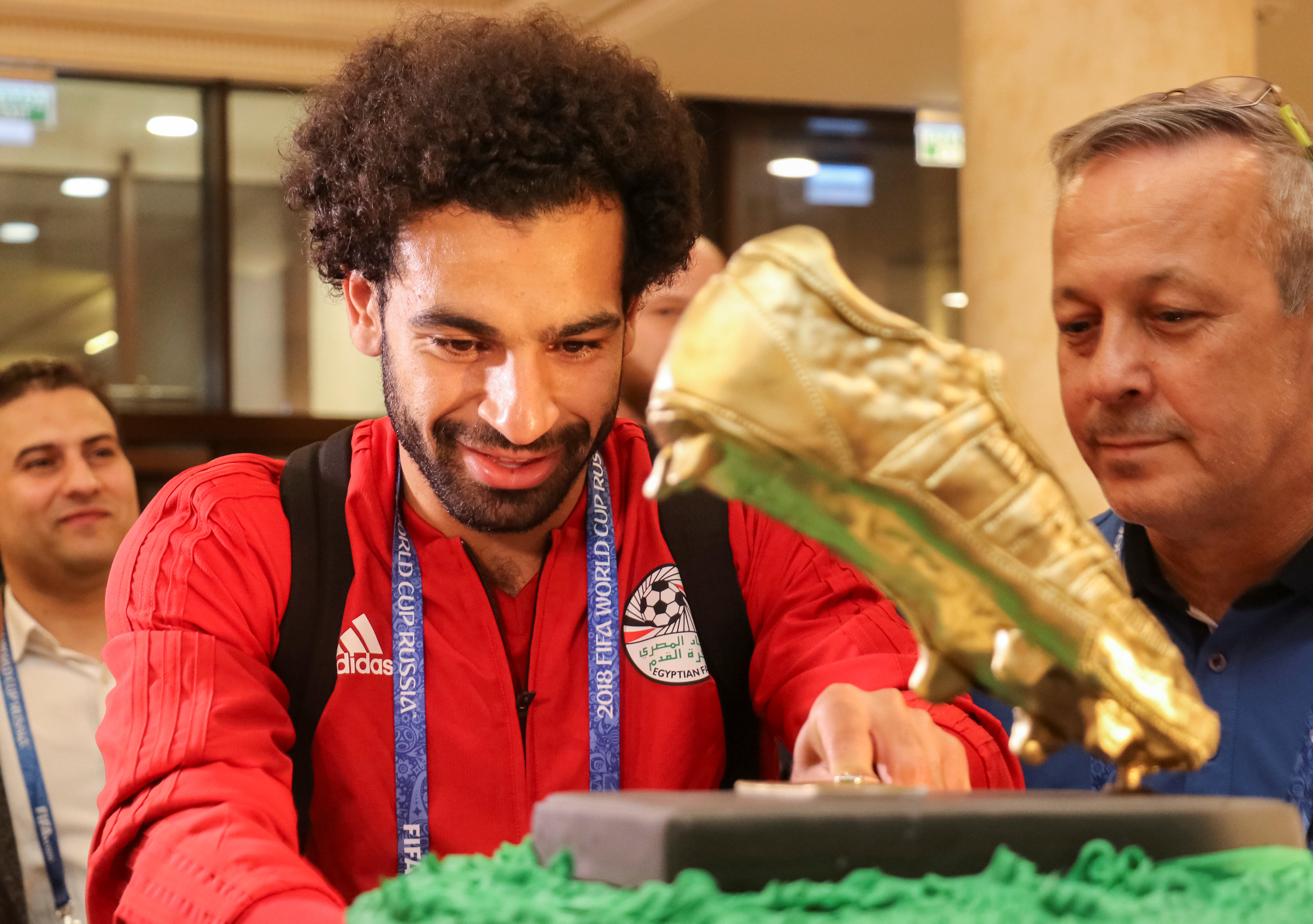 Egypt's Mohamed Salah receives a present on his birthday in Grozny