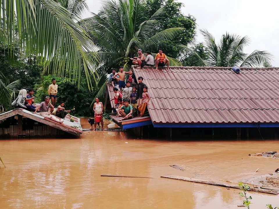 Villagers evacuate after the Xepian-Xe Nam Noy hydropower dam collapsed in Attapeu province