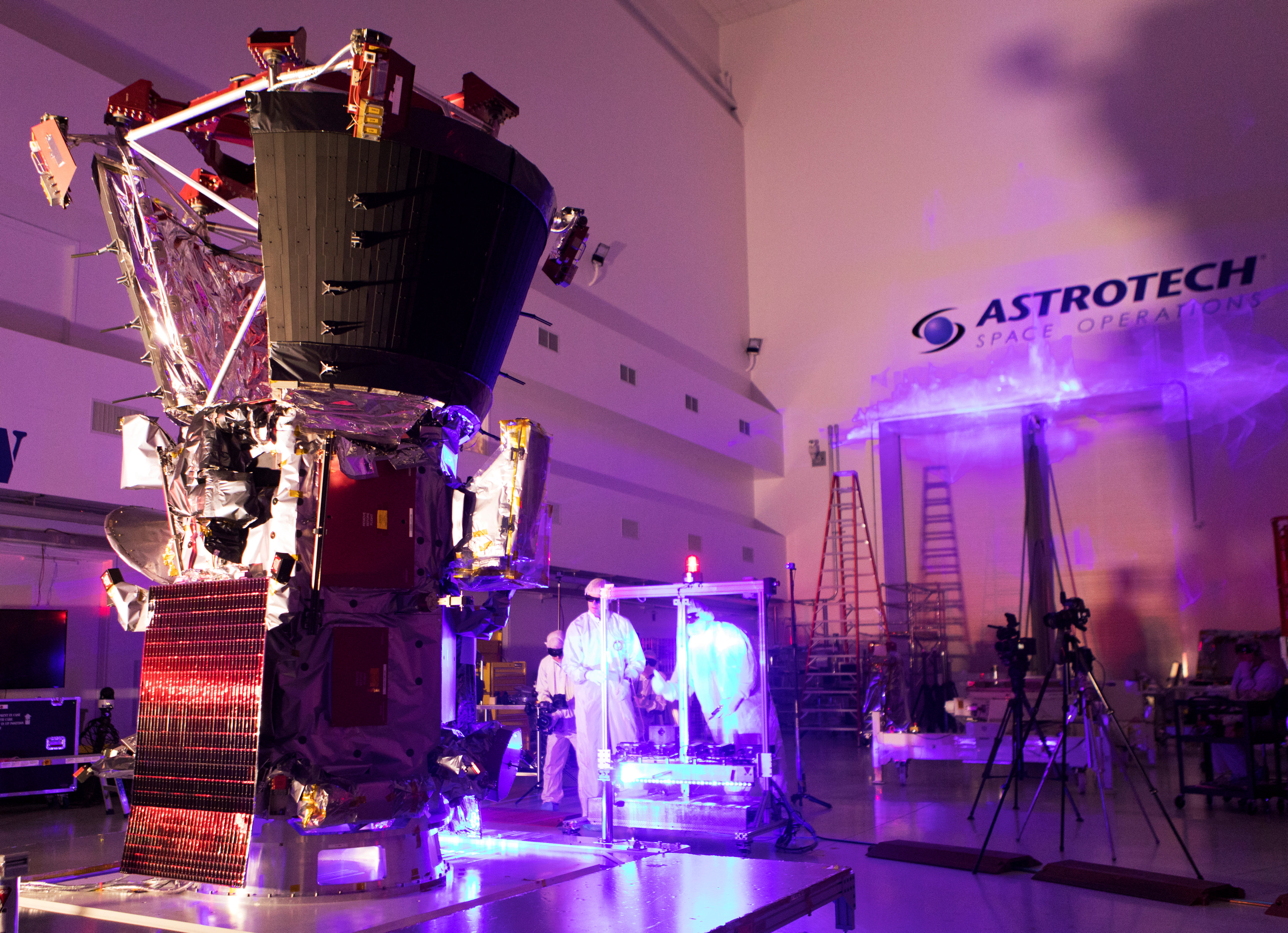 Technicians and engineers perform light bar testing on NASA's Parker Solar Probe in Titusville
