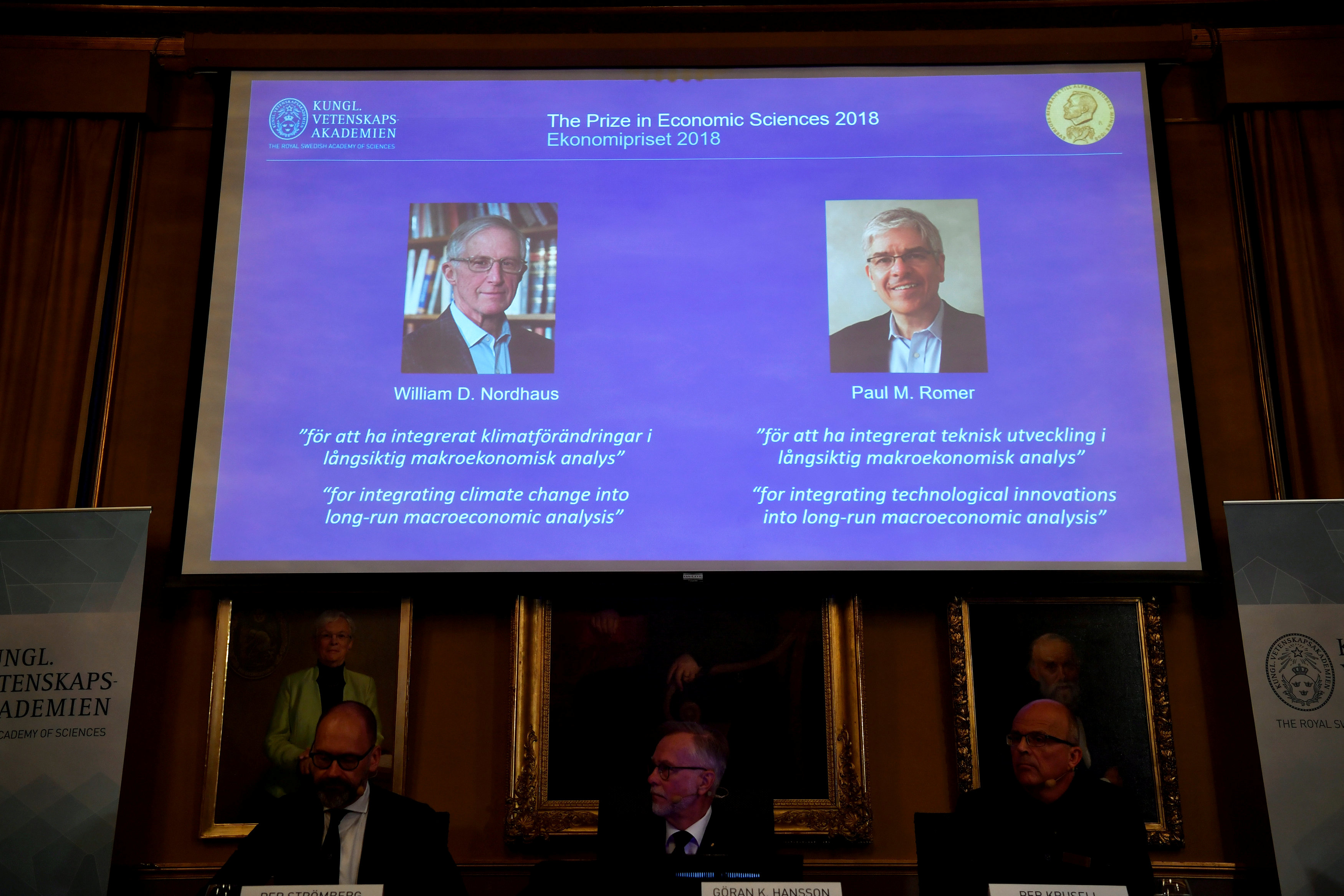 Per Stromberg, Goran K. Hansson and Per Krusell announce the laureates of the Nobel Prize in Economics during a press conference at the The Royal Swedish Academy of Sciences in Stockholm