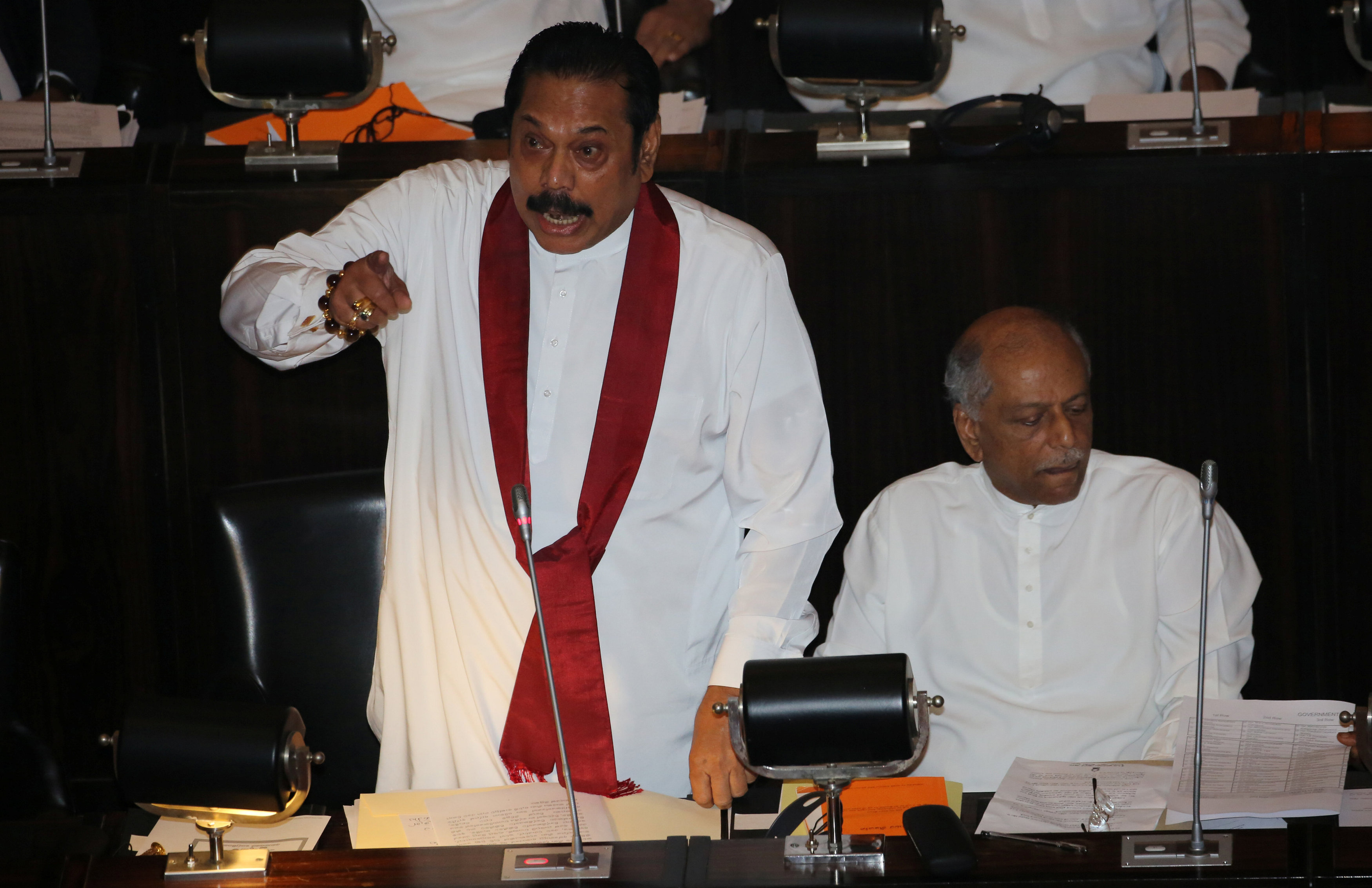 Sri Lanka's newly appointed Prime Minister Rajapaksa speaks during the parliament session in Colombo