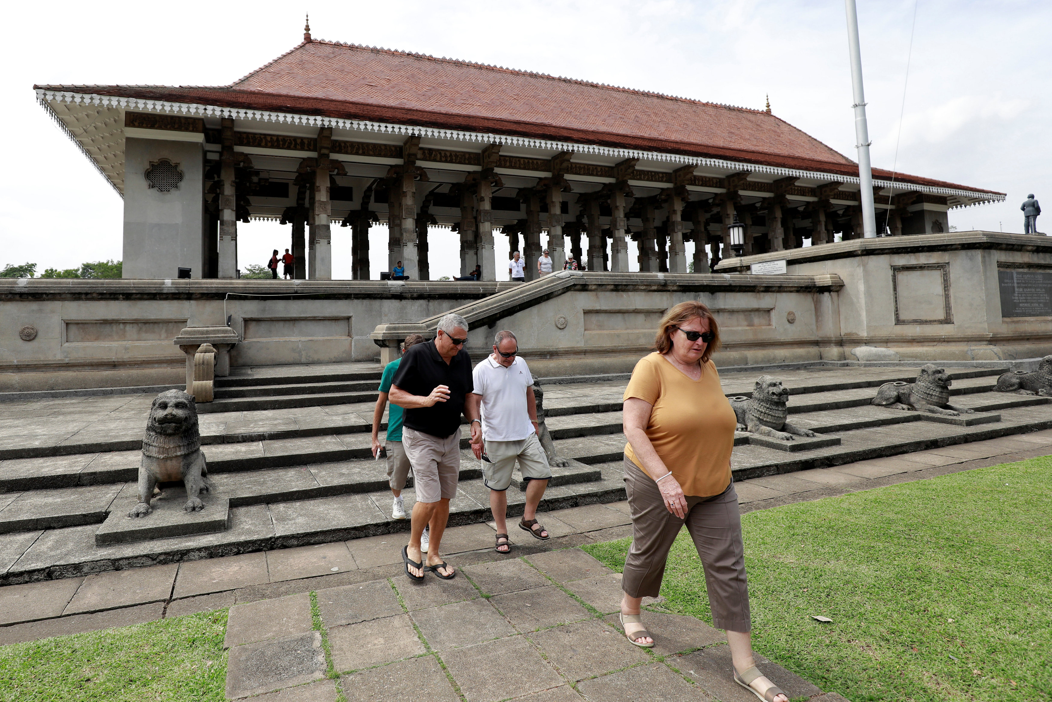 Tourists leave Independence Square after a visit in Colombo