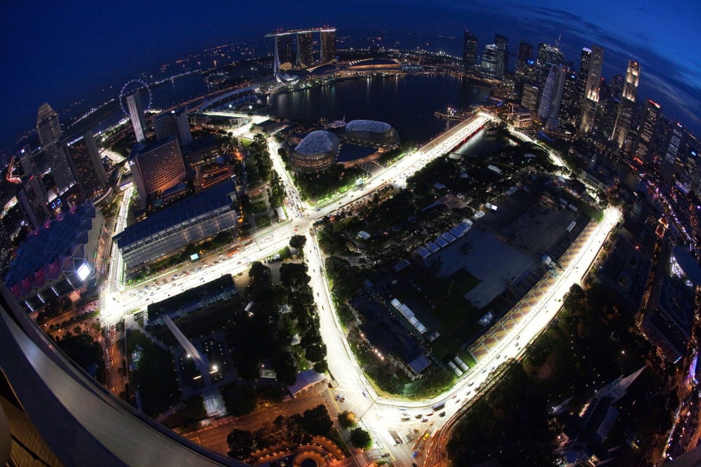 FILE PHOTO: A view of the illuminated Marina Bay street circuit of the Singapore Formula One Grand Prix at dusk