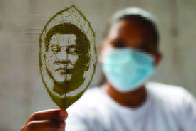 Filipino artist transforms leaves into creative portraits