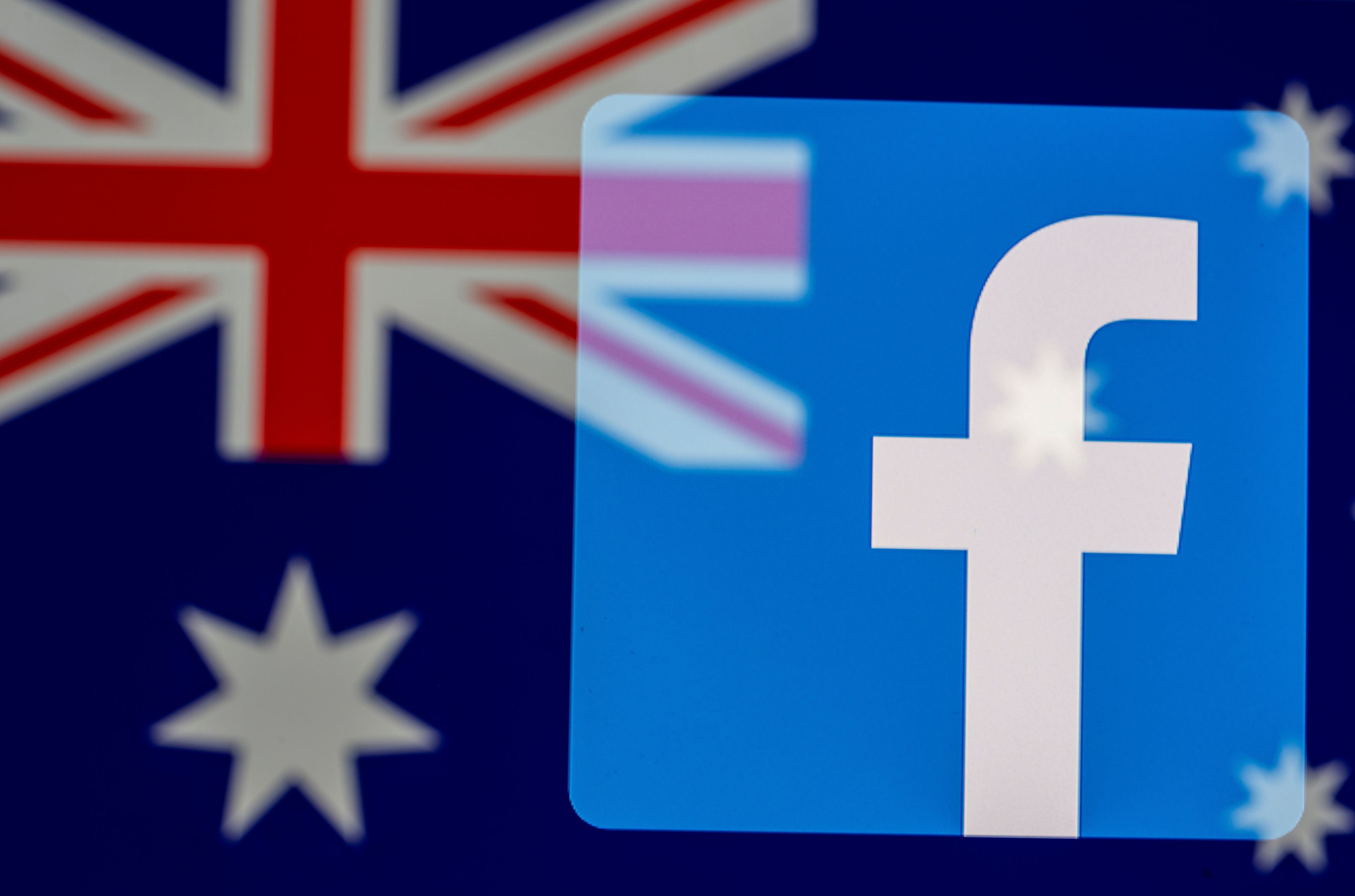 Facebook logo and Australian flag are displayed in this illustration taken