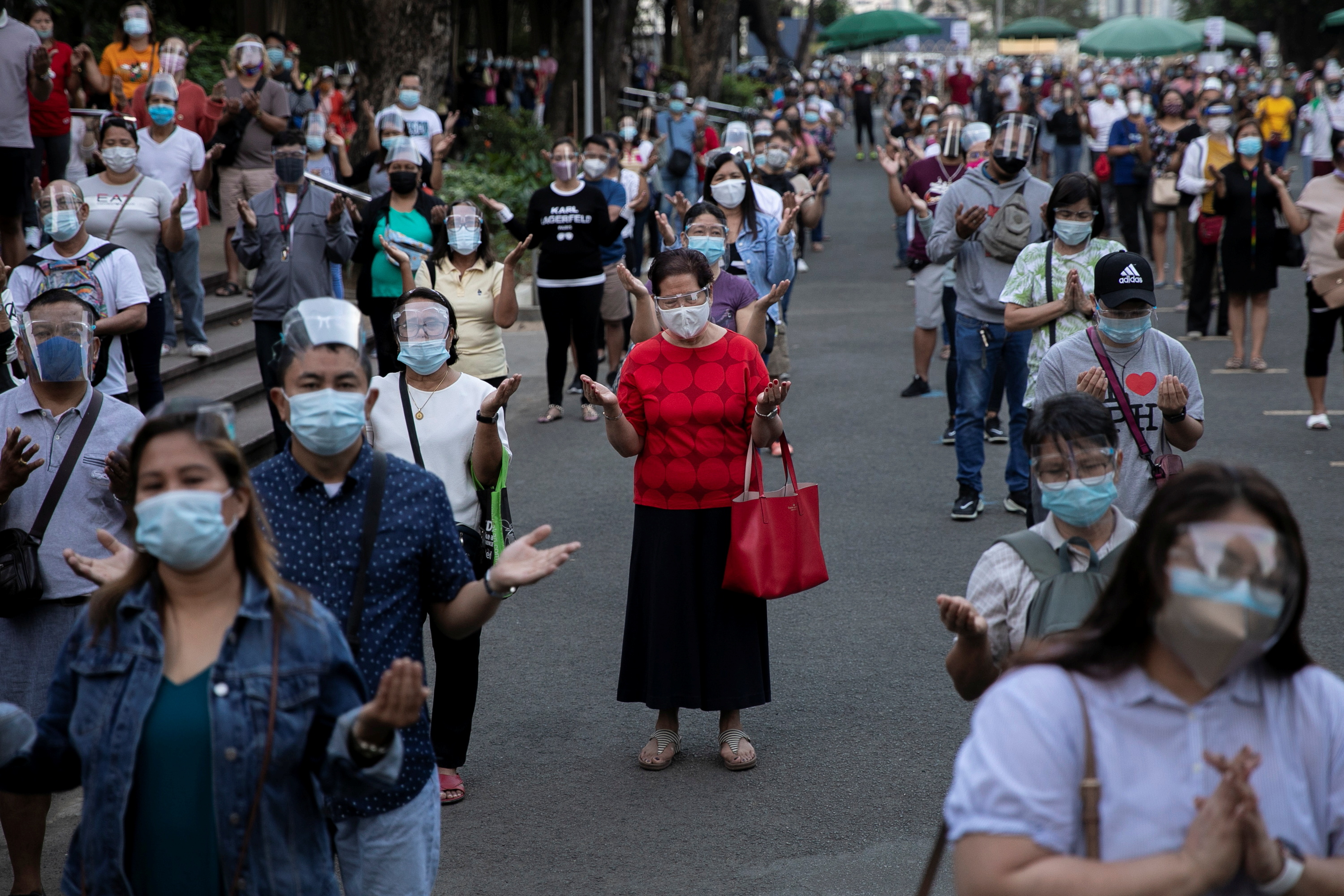 Filipino Catholics flock to church on Ash Wednesday amid the coronavirus disease (COVID-19) outbreak